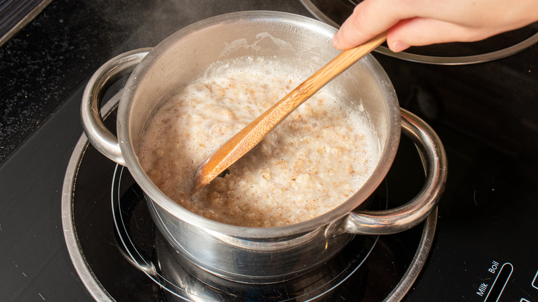 stirring a pot of oatmeal