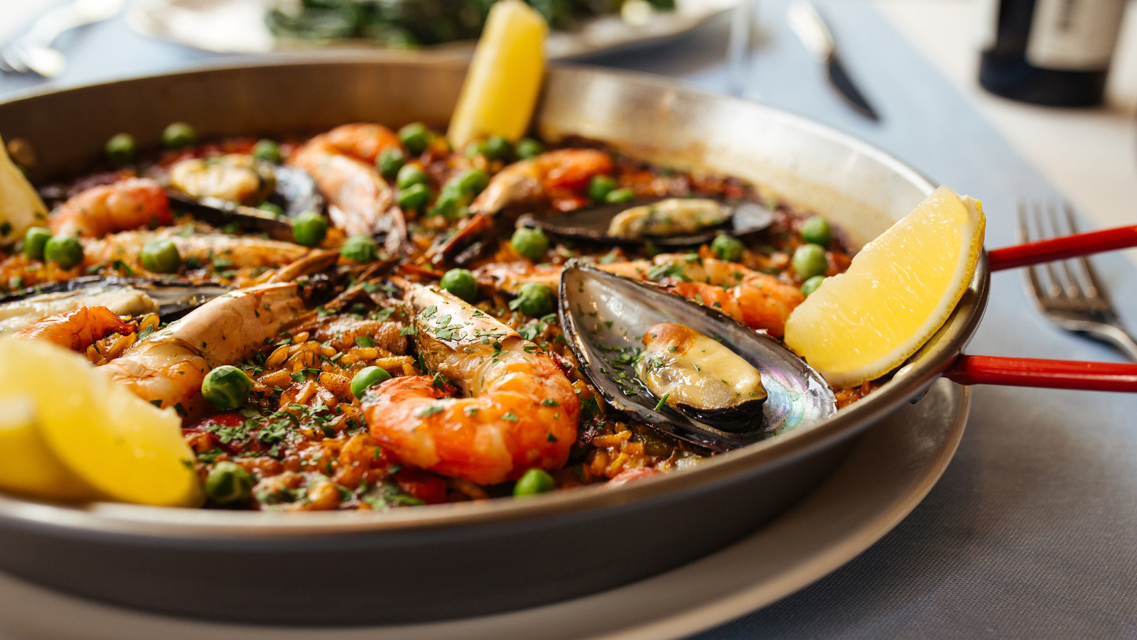 Why You Should Always Make Paella In A Wide, Shallow Pan