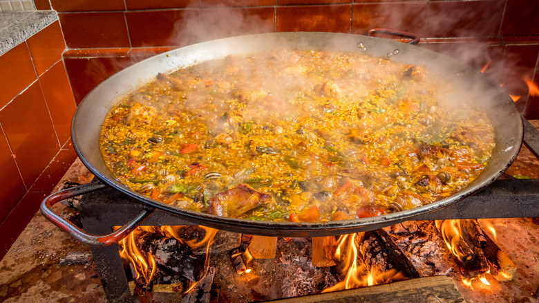 large paella traditional fire