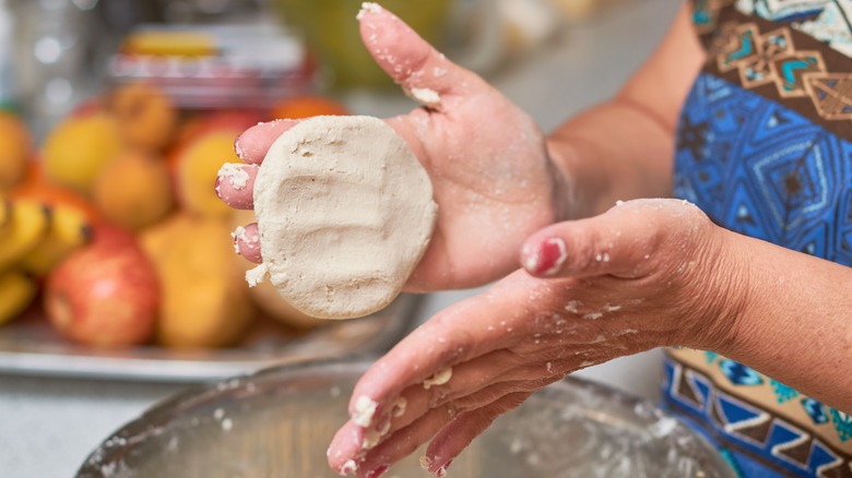 hand-making a tortilla