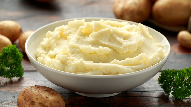 cubed potatoes going into boiling water