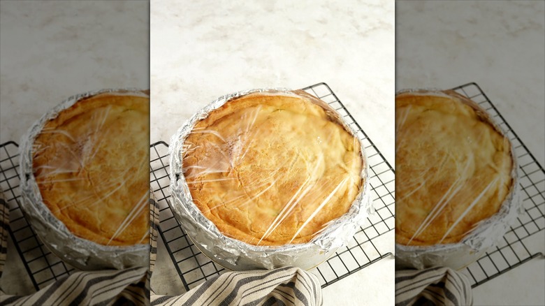 pie in foil and plastic wrap