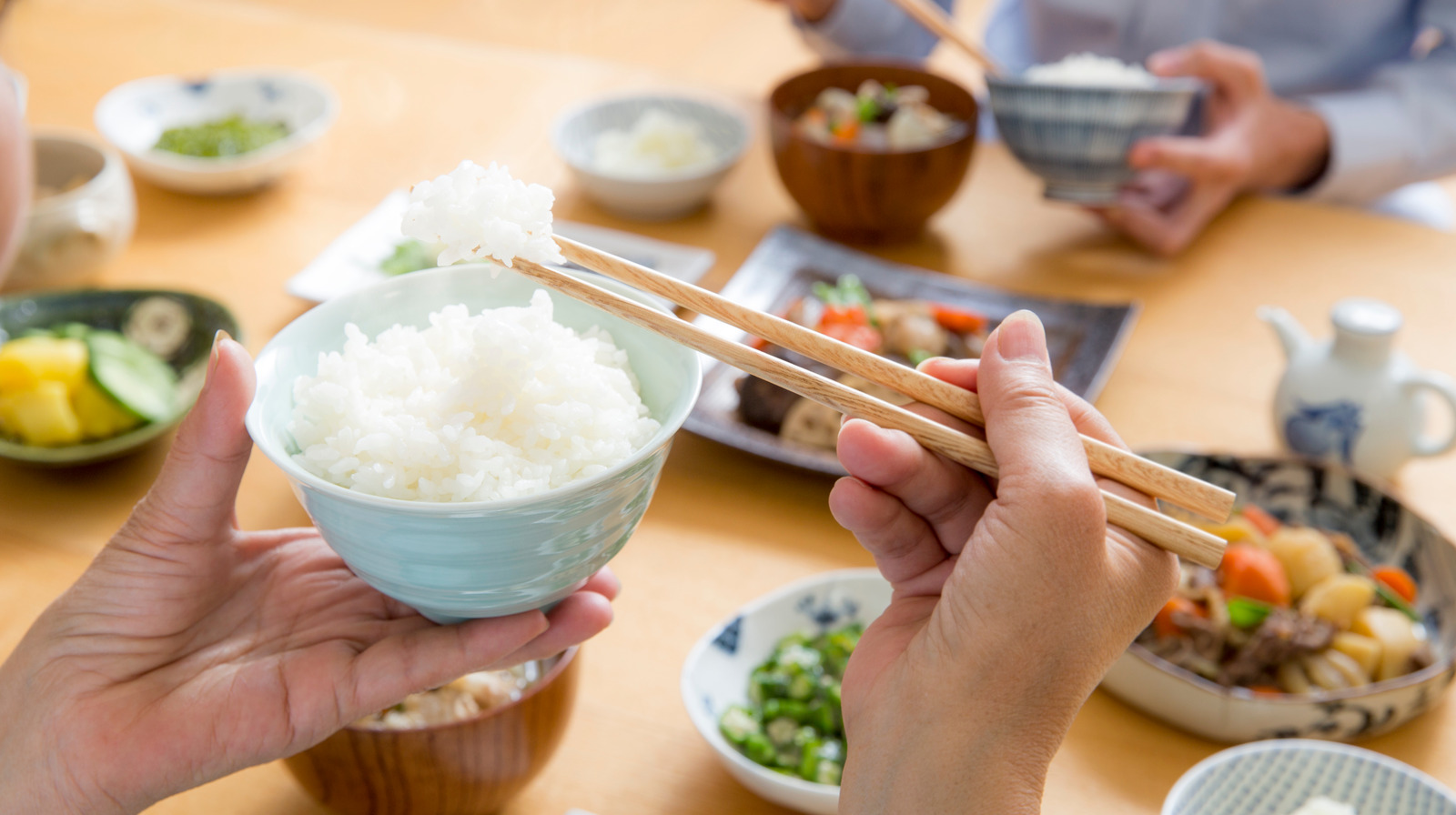 Why You Should Avoid Sticking Chopsticks In Rice At Restaurants