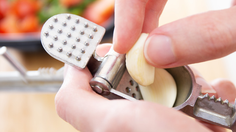 Using a garlic press