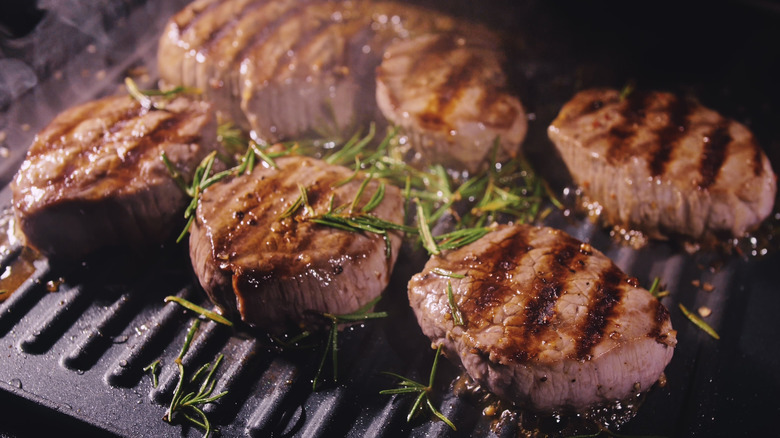 beef filets on the grill