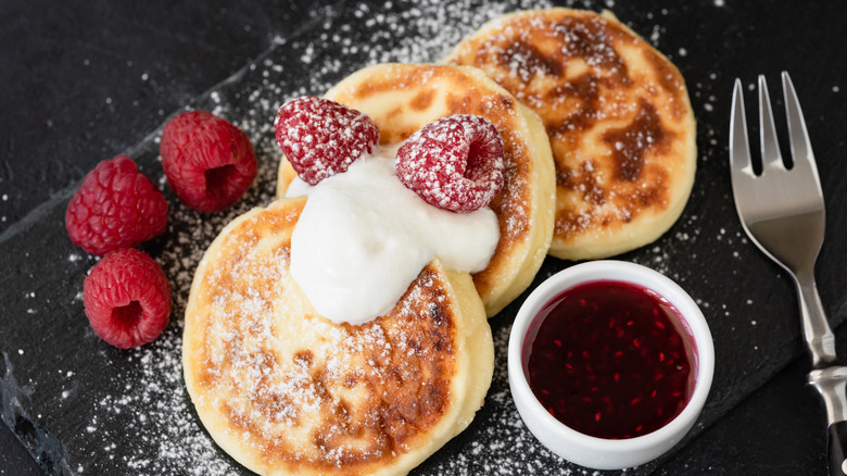 cottage cheese pancakes with berries and powdered sugar