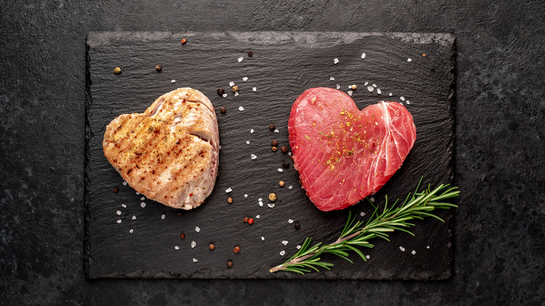 top down of heart shaped raw and grilled tuna steak