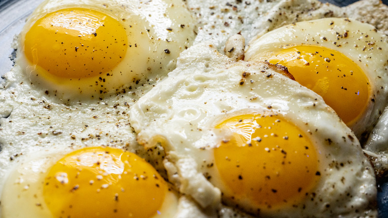 fried eggs with cracked pepper