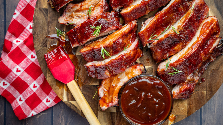 barbecue sauce brushed onto ribs