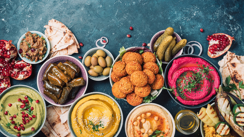 stuffed grape leaves, hummus, and pita bread