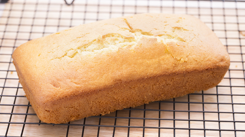 Pound cake sitting on cooling rack 