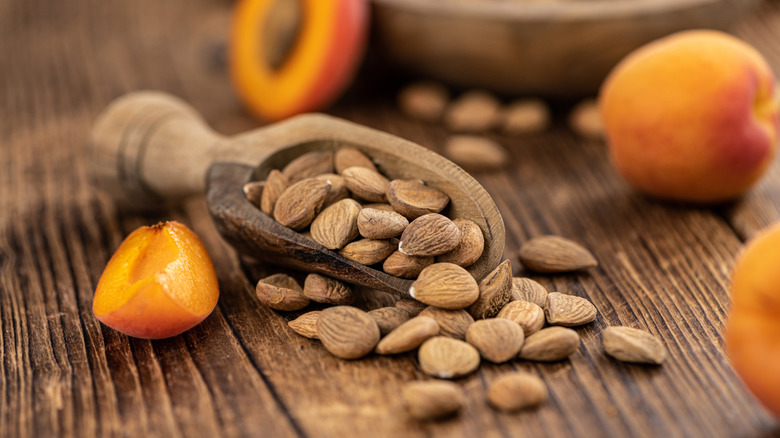 apricots and kernels on wood