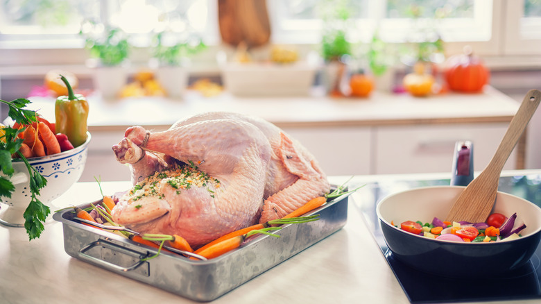 Raw stuffed chicken prepared for roasting