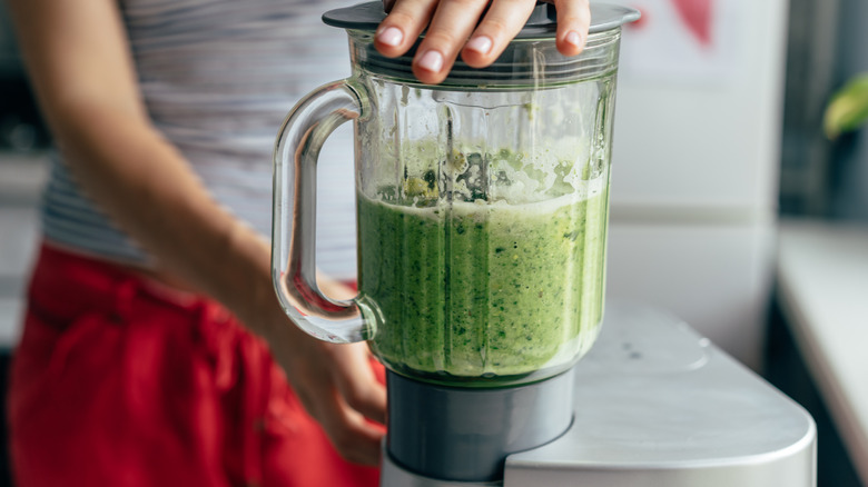 blending frozen green drink