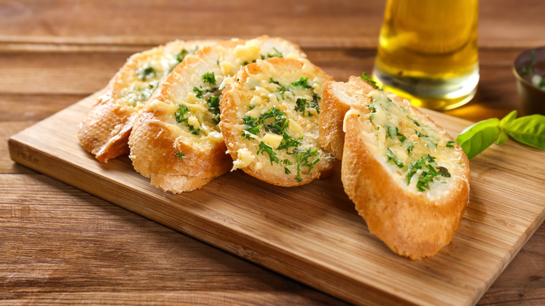 Garlic bread on a board