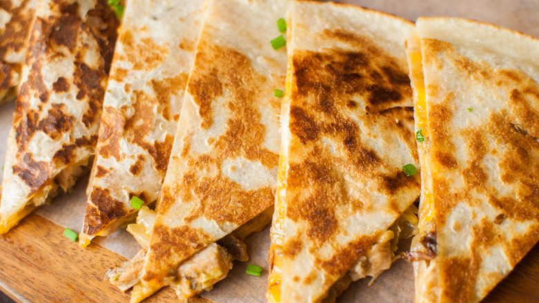 Quesadilla slices in a line