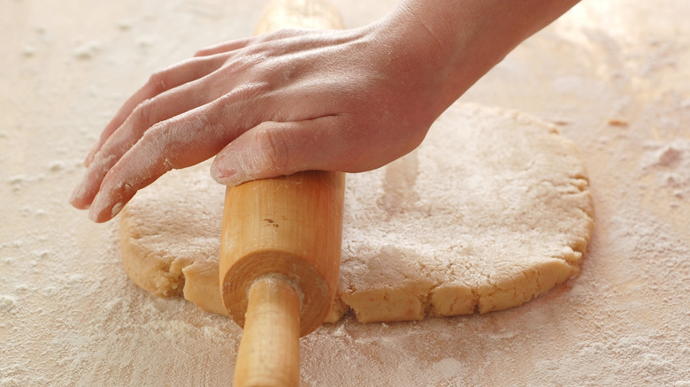 Biscuit dough and rolling pin