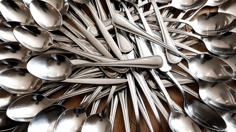 spoons arranged in a radial pattern