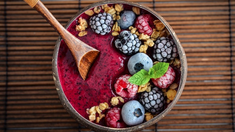 Smoothie bowl topped with berries 