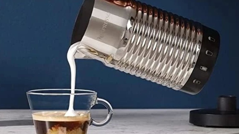 pouring milk from aeroccino