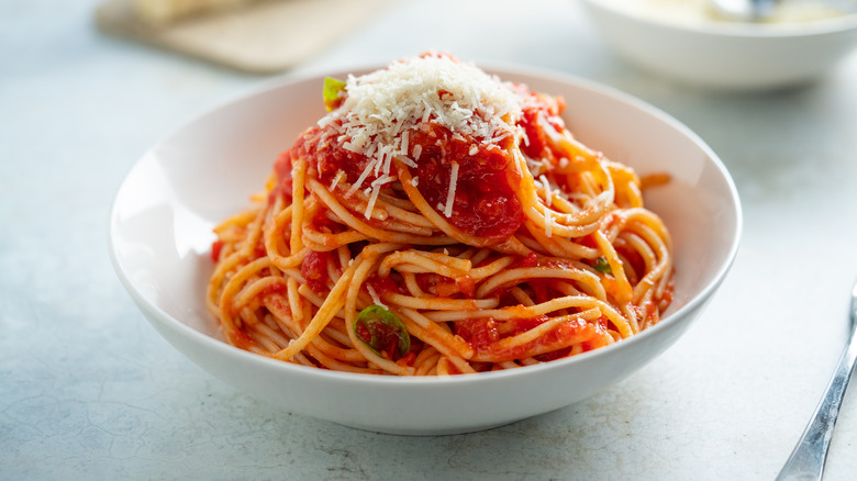 Plated pasta with grated cheese