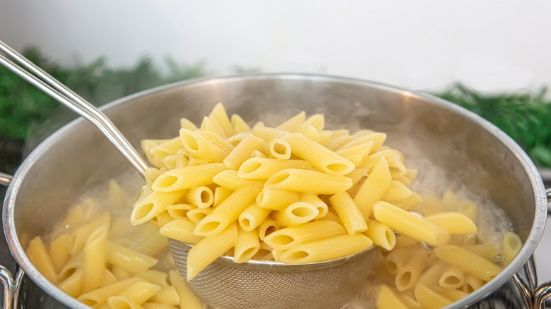 cooking pasta in a boiling water