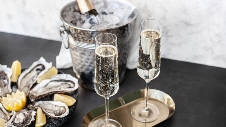 Champagne in an ice bucket and glasses