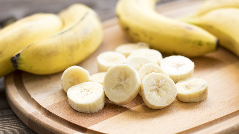 banana slices on wood board