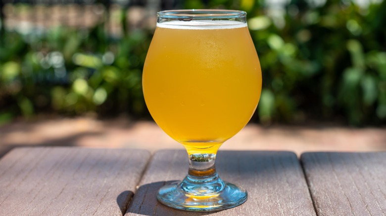 Pale beer in a stemmed glass