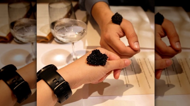 Close-up of caviar bump on hand