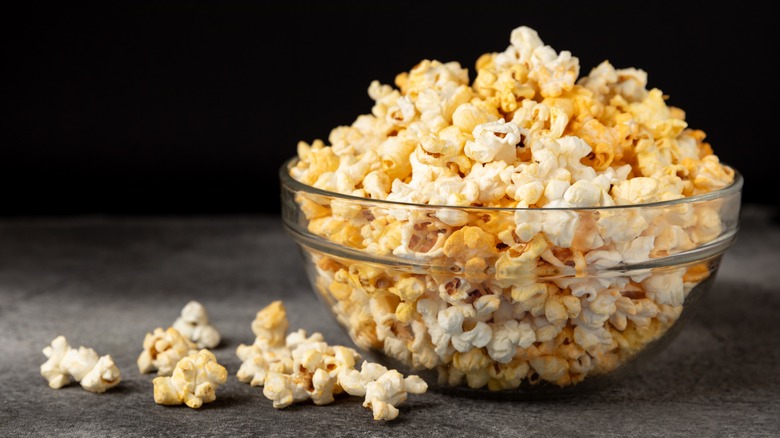 A glass bowl of popcorn