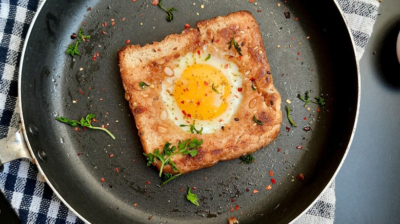 egg in a hole on pan