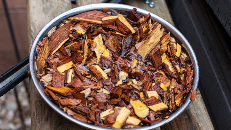 Bowl of wood chips soaking 