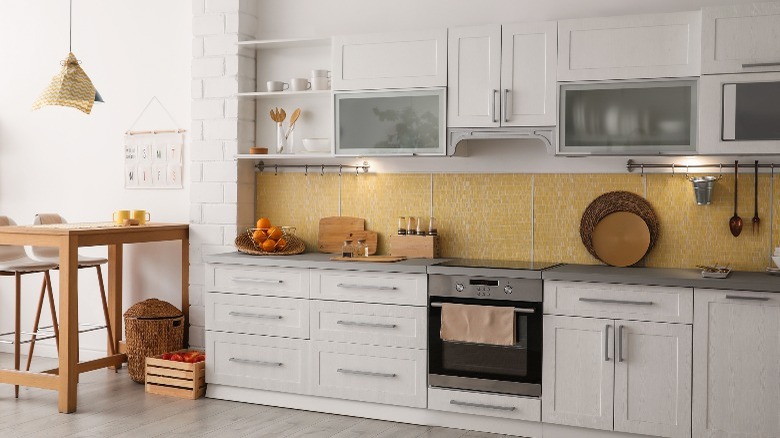 kitchen with stove and cabinets