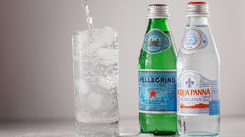 Bottles of Italian water with glass