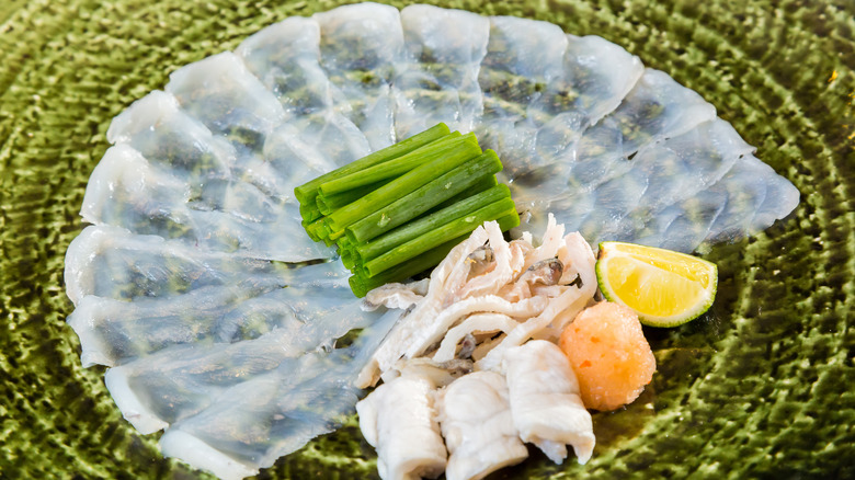 fugu sashimi fanned on plate