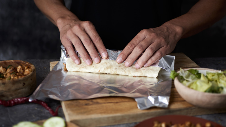 Wrapping a burrito in aluminum foil