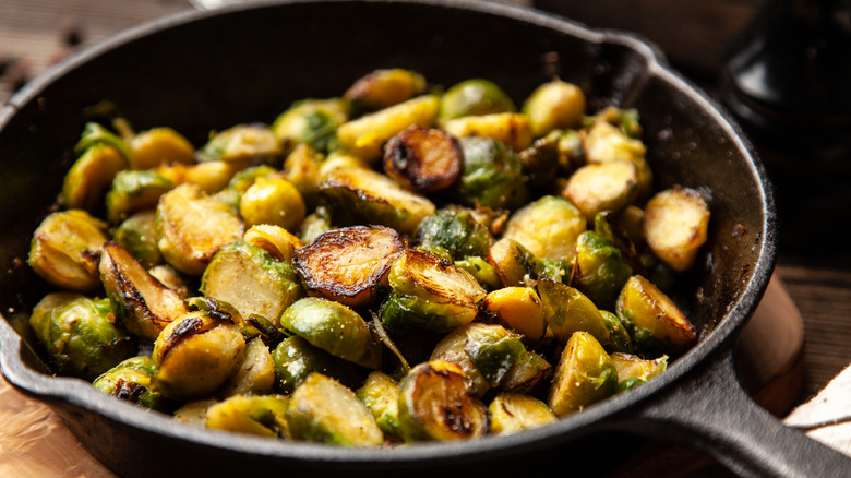 roasted halved Brussels sprouts in cast iron pan