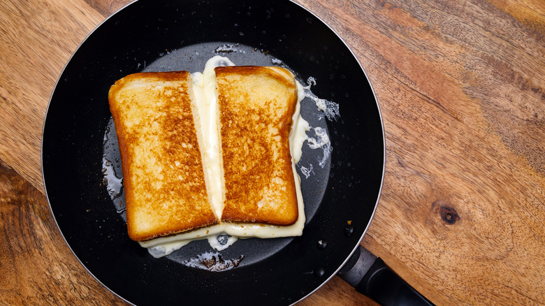 grilled cheese sandwich in pan