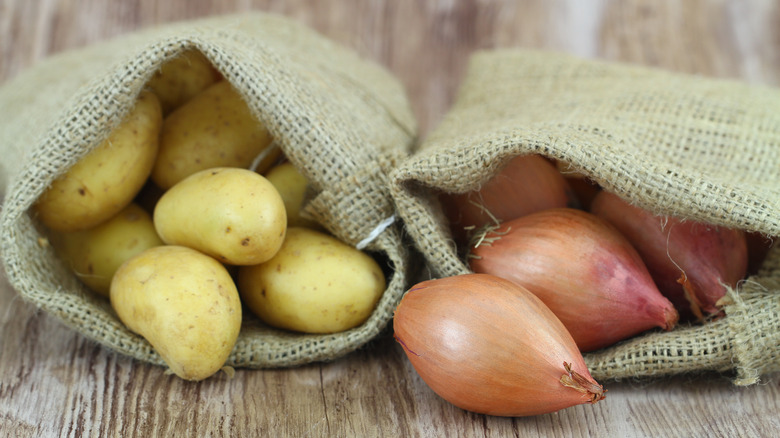 Onions and potatoes in bags