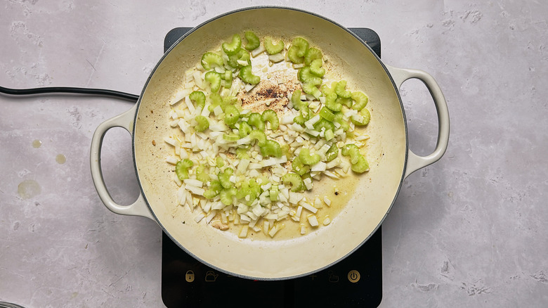 celery and onion in skillet