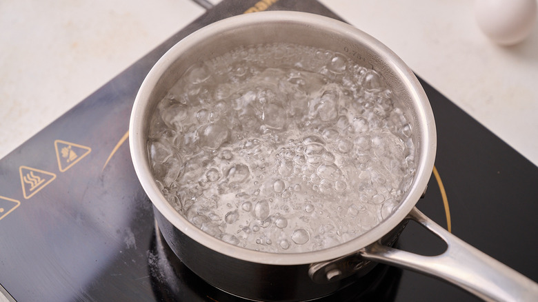 boiling water on stove