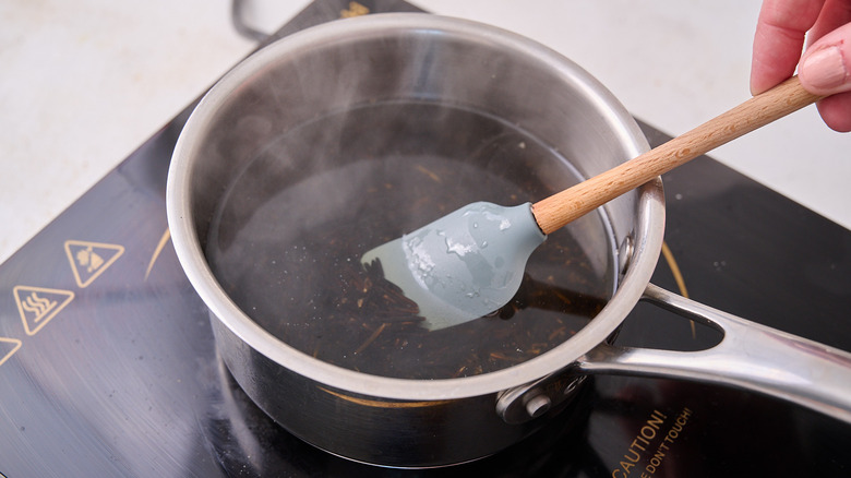 simmering wild rice in pot