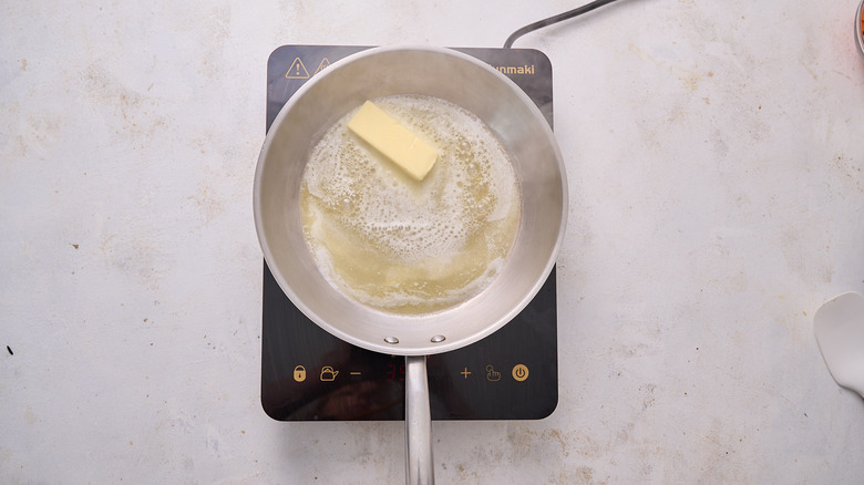 melting butter in skillet