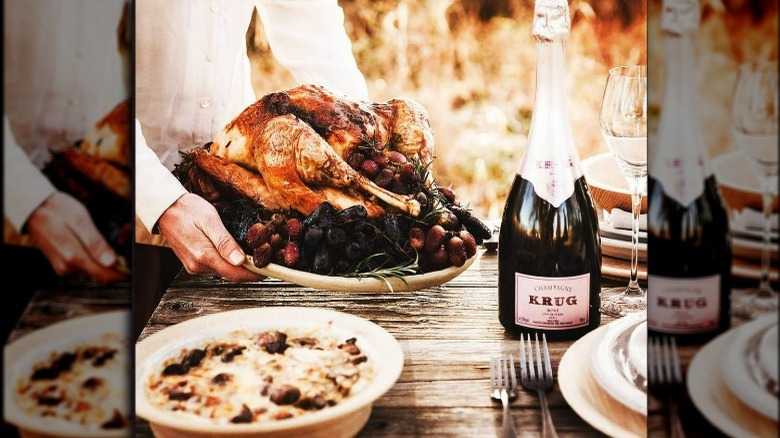 Champagne bottle on Thanksgiving table