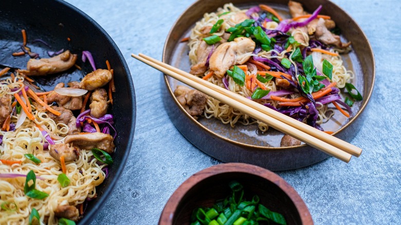 chicken noodle stir fry with chopsticks