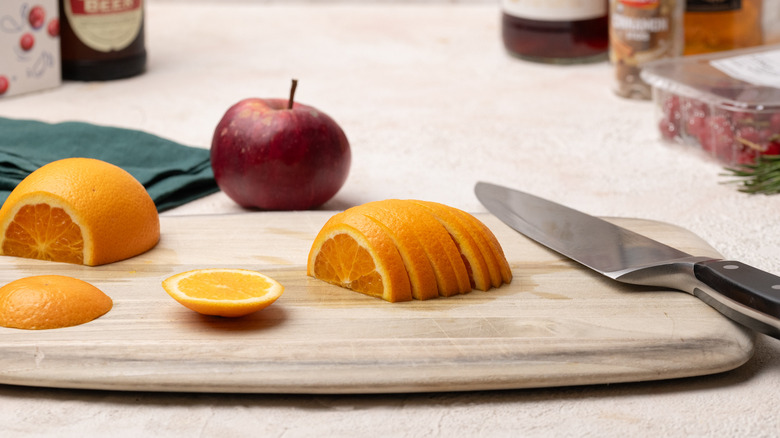 orange on a chopping board