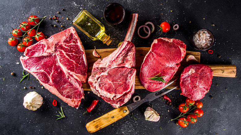 steaks with seasonings veggies and oil