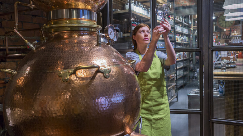 female distiller inside