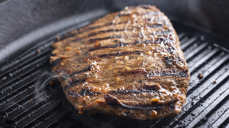 Flank steak on grill